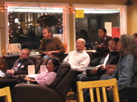 People intently watching the presidential debate at Grown Folks Coffee House, 10/15. Photo by Jason.