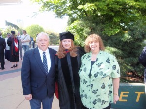 Alison Reese and her proud parents celebrate her graduation from Seattle University School of Law. Photo courtesy of Alison.
